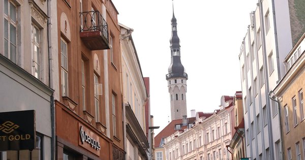 Tallinn's medieval Old Town skyline with church spires and red-roofed buildings