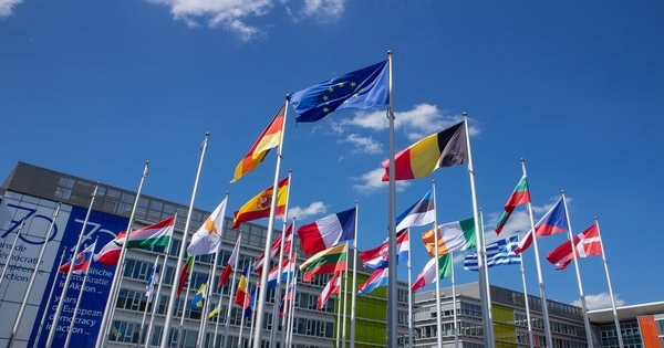 European Union flags outside a courthouse