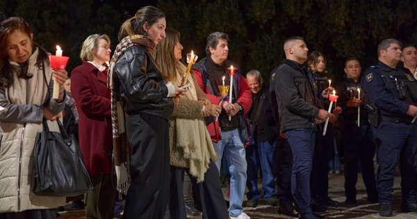 Candles lit at a vigil for LGBTQ+ victims of violence