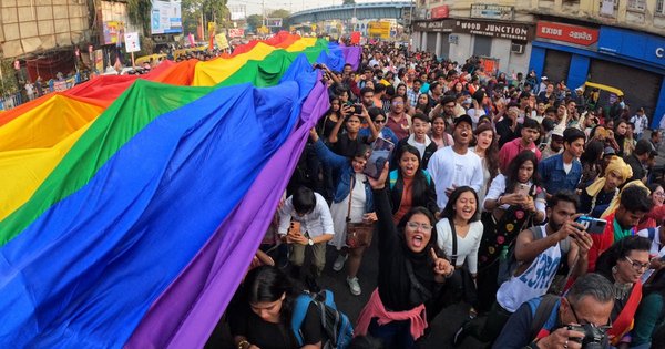 Text overlay reading India Passes Transgender Rights Amendment Bill Amid Sharp Criticism on a blue-purple gradient background