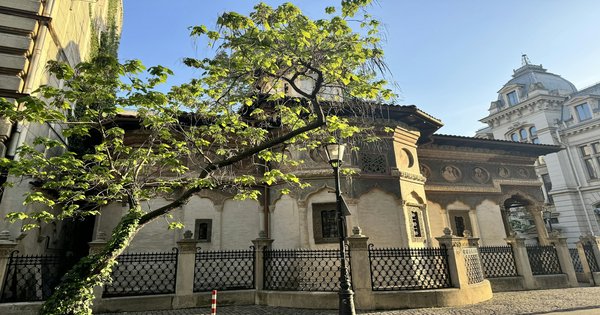 View of the Romanian Athenaeum in Bucharest with a clear blue sky above