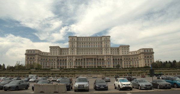 The Romanian flag flying outside the Palace of the Parliament in Bucharest