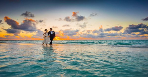 Two grooms celebrating their wedding in Thailand